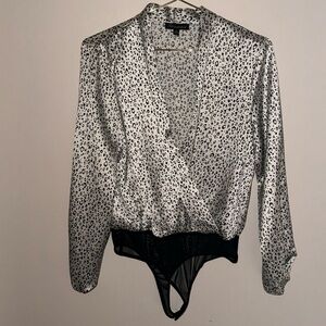 White and Black cheetah bodysuit size small